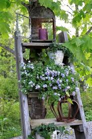 Shabby Cottage Garden Gardening Inspiration Ideas Wood Ladder Display With Lantern Light Flowers Etc Garden Art Beautiful Gardens Vintage Garden