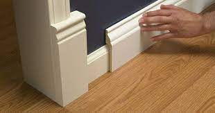 Install Wide Baseboard Molding Over Existing Narrow Baseboard A Stroll Thru Life Baseboards Baseboard Styles Baseboard Molding