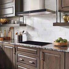 Most people make a contrast with white color backsplash tile, or they use dark color backsplash tile for dramatic effect. 5 Popular Granite Kitchen Countertop And Backsplash Pairings
