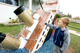 he built titanic model, put in yard to