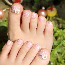She has got all the limited edition nail polishes and tons of incredible nail decoration items from funny cats to lovely sunflowers! Simple Flower Toe Nail Designs