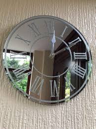 Designer wall clock lights make a great feature clock for home, kitchen or office, led light clock unique and exclusive to contemporary heaven. Round Silver Sparkle Glitter Mirrored Wall Clock Roman Number Glass Wall Clock New Buy Online In Burkina Faso At Burkinafaso Desertcart Com Productid 94161427