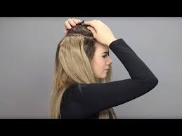 And unlike some hair extensions, application is as simple as clipping them in and yanking them out at the end of the night. How To Put On And Wear Clip On Hair Extensions Youtube