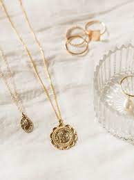 Our St Christopher Necklaces Are Seriously The Prettiest Protection Necklaces Jewelry Photography Styling Jewellery Photography Inspiration Jewelry Photoshoot
