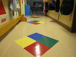 Commercial Vct Vinyl Composite Tile In A Daycare Tile Patterns Vct Tile Showroom Interior Design