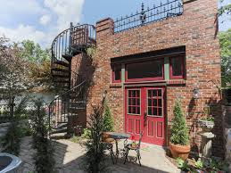 You can build a deck on a garage, provided you have a garage with a flat roof, or if you plan to build a garage that will be adjacent to the house but below the level of the main floor. Lafayette Square Garage With Roof Top Deck Victorian Exterior St Louis By More For Less Remodeling Houzz