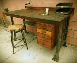 An espresso wood top and metal frame make this the perfect desk or table. Vintage Industrial Desk Workbench Vintage Industrial Furniture Vintage Industrial Desk Vintage Industrial