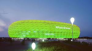 First plans for a new stadium were made in 1997, and even though the city of munich initially preferred reconstructing the olympiastadion, they eventually went ahead with the clubs' proposal for an entire new stadium. Allianz Arena Leuchtet Am St Patrick S Day In Grun Stadt