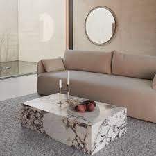 This convertible coffee table from dwell is two tables in one. Menu Plinth Low Rose Marble