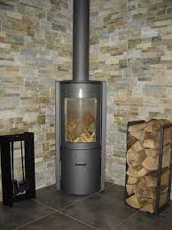 Poele Stuv 30 Compact Et Parement Pierres Naturelles Poele A Bois Briquette De Parement Cheminee Design