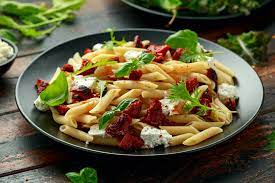 With the motor running, add the olive oil in a thin, steady stream until smooth. Pesto Pasta With Chorizo And Olives Recipe Hans