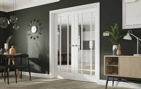 It has glass sliding doors that open to the balcony. Dining Room Doors Inspiration Ideas For The Dining Room