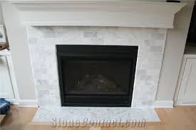 Tiling over a fireplace surround that already has tile attached is easier than you might think. Carrara White Marble Subway Tiles Fireplace Surround Thinkrock Stone From China Stonecontact Com