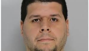 Man charged with using fake money