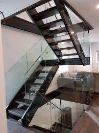 Stainless steel stair with glass steps. Metal Stairs Toronto Floating Stairs Toronto