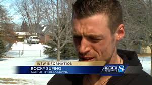 Son of woman charged in double murder case speaks out