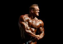 HD wallpaper: pose, hairstyle, muscle, bodybuilding, background black,  bodybuilder | Wallpaper Flare