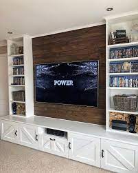 This modern, straight line designed entertainment center is going to be suitable for a tv up to 60 in size. How To Build An Entertainment Center Wall Unit Paulbabbitt Com