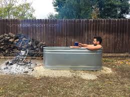 This Diy Wood Fired Hot Tub Is Made From A Stock Tank And Copper Tubing And Cost Less Than 250 Full Instructio Stock Tank Hot Tub Outdoor Bathtub Diy Hot Tub