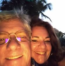 Do you sand between coats of topcoat?