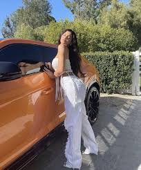 Kylie jenner is a young tv star that has already made a great career for herself from an early age. Kylie Jenner Flaunts Her Summer Wardrobe While Striking A Pose With Her Lamborghini Urus Worth Over Rs 3 10 Crores Bollywood News Bollywood Hungama