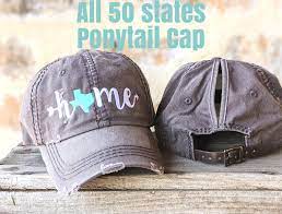 50 States Ponytail Cap State Ponytail Cap State Messy Bun Etsy In 2021 Pride Gifts Messy Bun Hat Cap