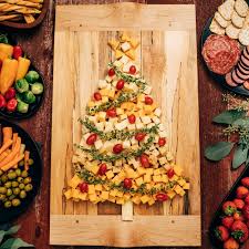 Cut bread slices into christmas tree shapes using large cookie cutters. Christmas Appetizer Cheese Plate