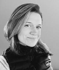 What are the details of the camp guided by a US Ski Team member?