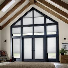Dress your garage windows in coverings that shield the interior space from prying eyes and the sun's ultraviolet rays. Hunter Douglas Skyline Window Coverings Specialty Shape Solutions Skyline Window Coverings