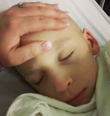 Two thumbs up for Jackson whose chemo port was removed this week. His mom  shared: “If you look closely, you can see the marks from all the pokes he  received, like tiny