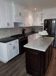 White kitchen cabinets with black granite photoshop texture packs. Black Countertop White Cabinets Expresso Island Arctic White Granite White Cabinets Black Countertops Kitchen Design Kitchen Remodel