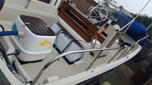 Centre console and rear bench seat covers. Sold 17ft Boston Whaler Montauk 1988 Bloodydecks