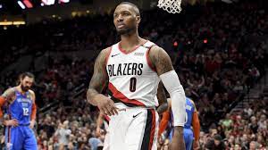Place your back on a ball and feet flat on the ground with your hips elevated and knees bent. Damian Lillard S Tattoos Include Raiders Logo Design On Warriors Jerseys Heavy Com