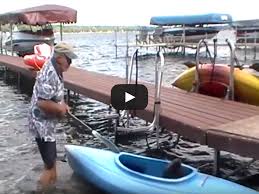 Launching a kayak from a dock. Kayak Dock Rack Lift And Paddleboard Sup Rack Lift Dock Craft