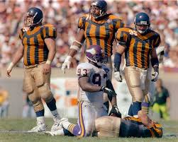 The chicago bears of the national football league sport a wishbone 'c' logo, which the team has used since the 1960s. Take A Look Back At A Century Of Chicago Bears Uniforms Including 97 Years Of Orange And Blue And 3 Of Red And Gold Chicago Tribune