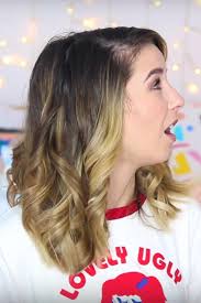 Next, you'll want to break up the curls and tease the top and back of the hair to create volume. Zoella S Hairstyles Hair Colors Steal Her Style