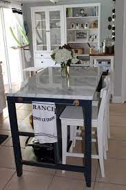 Create the waterfall kitchen island using ikea butcher blocks and use an ikea expedit bookshelf for the mini island. Fashion At Forty Ikea Kitchen Island Marble Top Kitchen Island Diy Kitchen Island