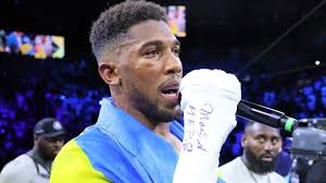 Joshua throws belts and storms out of ring!