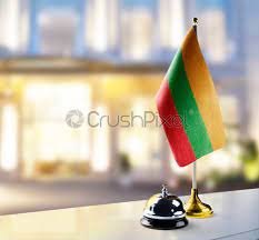 On a desk we asked the man on the information desk for a map of the city. Lithuania Flag On The Reception Desk In The Lobby Of Stock Photo Crushpixel