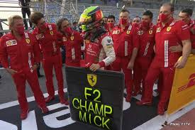 Schumacher is calm and relaxed, sat in full ferrari gear, including the baseball cap and now mandatory mask. Mick Schumacher 2020 Formula 2 Champion Grand Prix 247