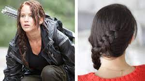 Since then we have been able to see that her braid starts lower, behind her ear and the top layer of hair was curled to add texture. How To Katniss Everdeen Braid Dutch Braid Youtube