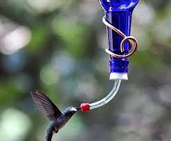 A little sugar and water is all you need; Make A Wine Bottle Hummingbird Feeder Container Water Gardens
