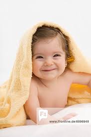 Close up of baby girl, smiling