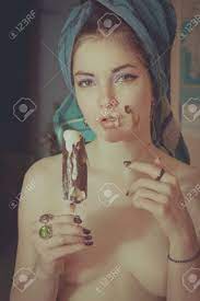Naked Woman Eating Ice Cream Stock Photo, Picture And Royalty Free Image.  Image 69128359.
