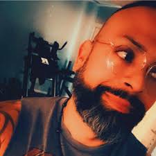 The image shows a close-up of a Spinosaurus aegyptiacus jaw with its  characteristic straight, conical teeth, adapted for catching fish. The  elongated snout and tooth shape are key identifiers of this semi-aquatic