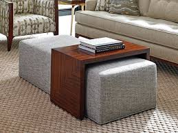The coffee table features a rectangular table top perched on sawhorse style tapered legs. Footrest Coffee Table Large Size Of Ottoman Marvelous Coffee Table Footrest Ottoman Take Five Co Storage Ottoman Coffee Table Fabric Coffee Table Ottoman Table