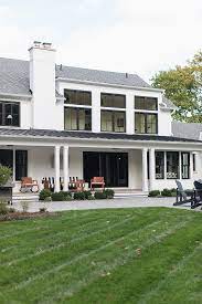 Both traditional and modern farmhouses can mix a variety of window sizes and shapes, typical of the asymmetrical architecture. Black And White Modern Farmhouse Home Bunch Interior Design Ideas