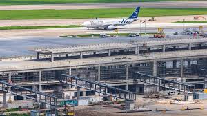 New Pudong Airport Satellite Terminal Receives Building