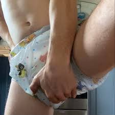 Showing off my cloth diaper and plastic pants. - ThisVid.com