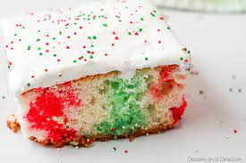 This sensational strawberry poke cake only takes 15 minutes of prep and six ingredients to make. Christmas Jello Poke Cake Recipe Christmas Rainbow Cake